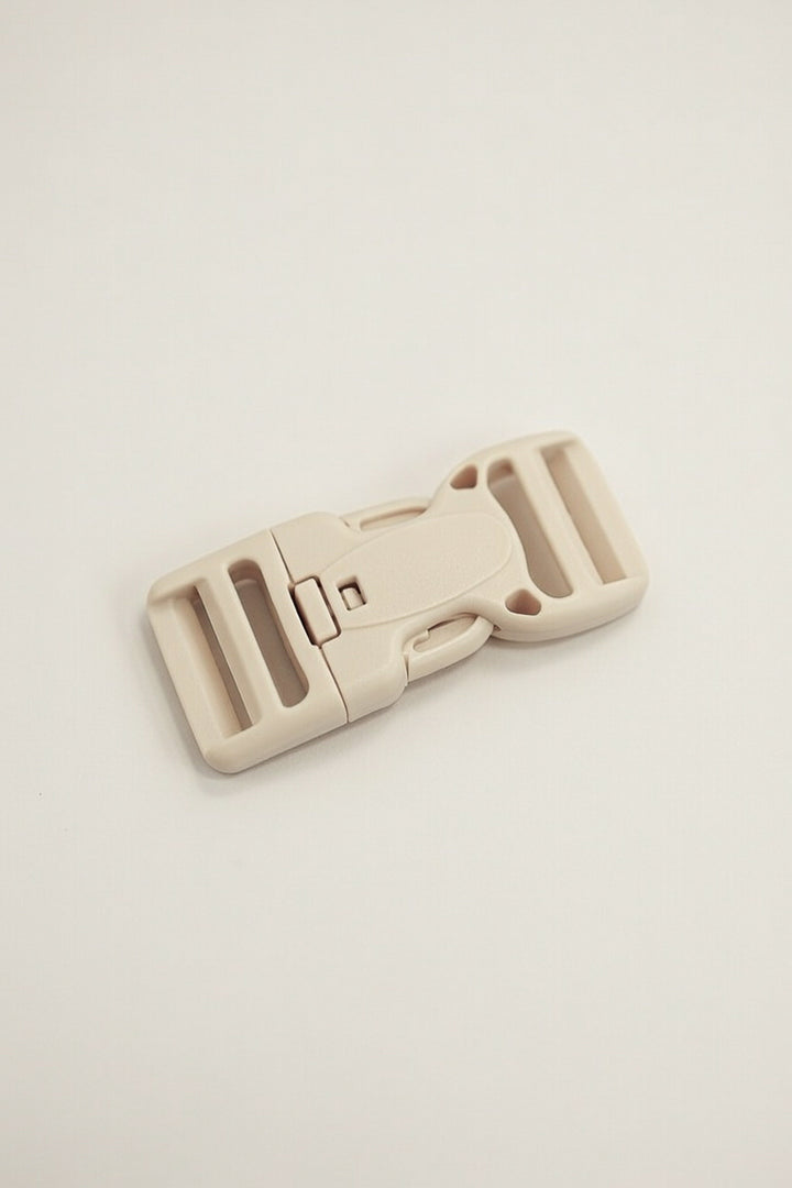Buckle with safety button 25mm beige